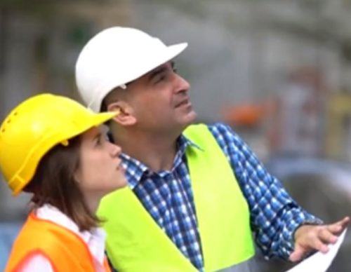 Female apprentice learning from boss