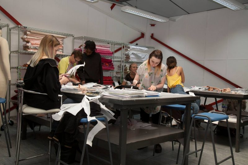 Textiles Students at work pattern cutting