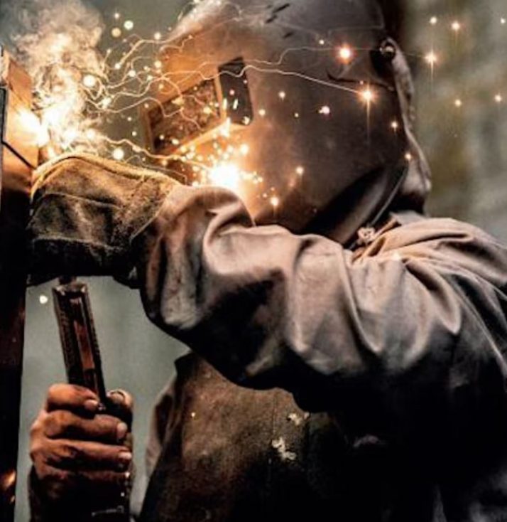 person soldering